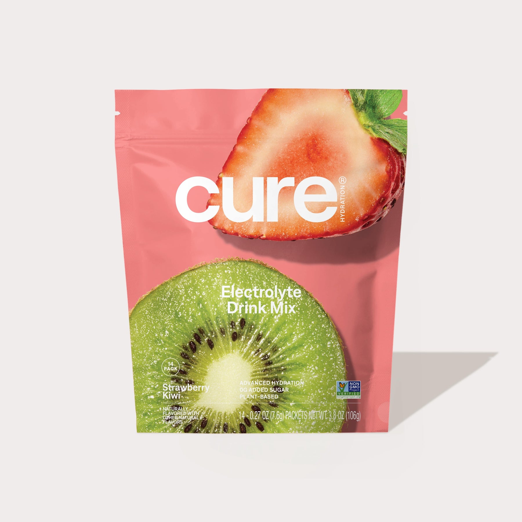 Cure Electrolyte Drink Mix package with images of a kiwi slice and a strawberry on a pink background