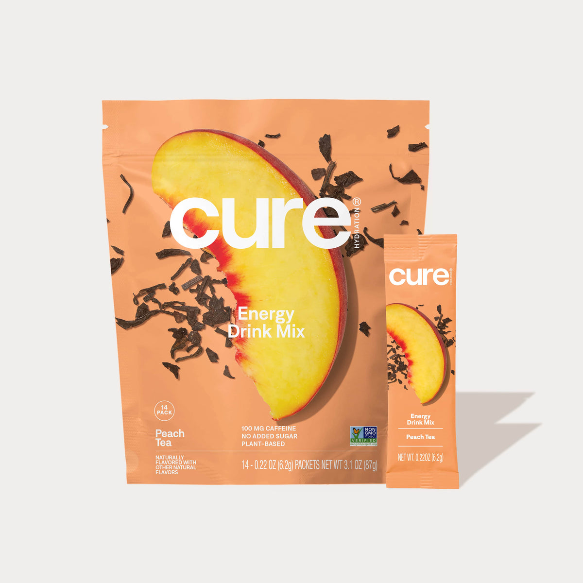 Cure Energy Drink Mix Peach Tea flavor packet and pouch with a peach slice and tea leaves on the packaging