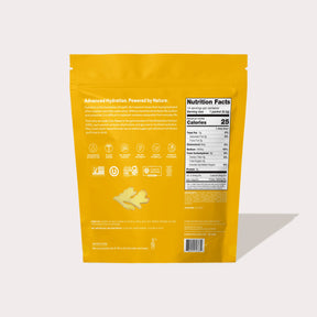 Back of yellow Ginger Turmeric product package showing nutrition facts and icons