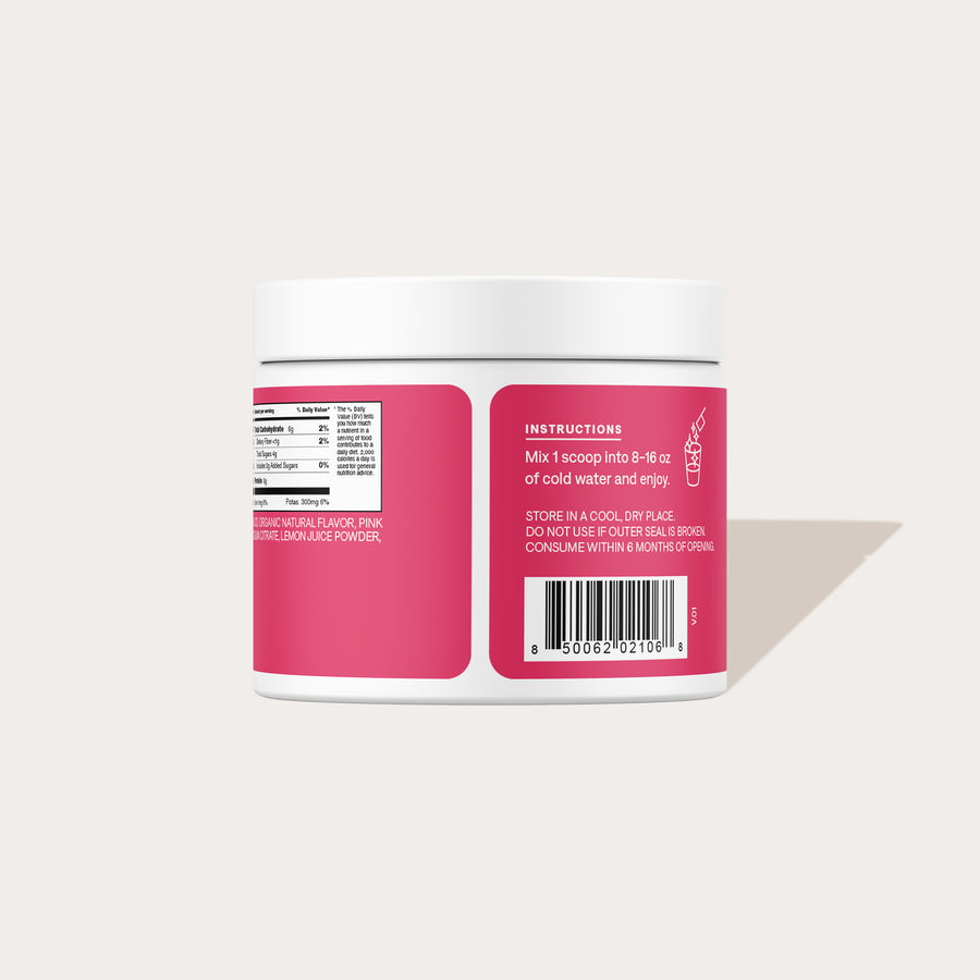 Rear view of Tropical Punch bulk jar showcasing instructions, nutrition facts panel, and barcode on pale beige background