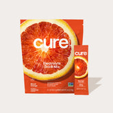 Cure Electrolyte Drink Mix Blood Orange flavor packaging with a large blood orange slice image