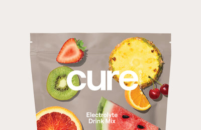 cure Electrolyte Drink Mix Tropical Variety Pack 28 PACK pouch showing watermelon, pineapple, kiwi, strawberry, orange, cherries